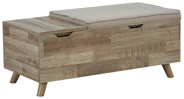 Storage bench with hidden compartments in a compact room