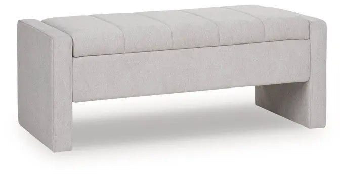 Gray upholstered storage bench with channel tufting