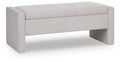 Gray upholstered storage bench with channel tufting
