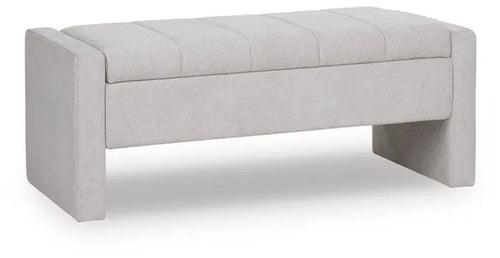 Gray upholstered storage bench with channel tufting